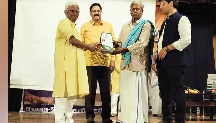 Rajoli farmer Poolapapi Reddy received the Best Farmer Award for his contributions to millet farming, water management, and training young farmers.