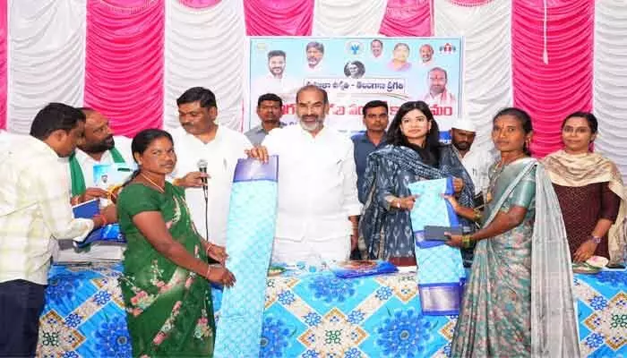 Indiramma Mahila Shakti sarees were distributed in Chandurthi and Malyala villages, empowering women and supporting SHG industries.