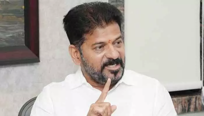 With Karnataka Congress tensions rising, CM Revanth travels to Bengaluru for key talks amid Siddaramaiah–DK Shivakumar leadership rift.