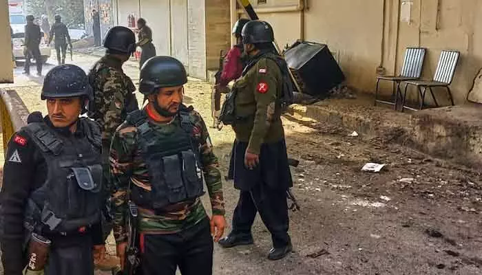 Multiple suicide attacks hit Peshawar, Pakistan targeting Frontier Corps HQ. Security forces retaliate; several militants killed in ongoing clashes.