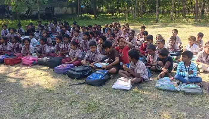 Primary schools in Sonal Mandal, Adilabad face teacher shortage. Only two teachers manage 126 students; parents demand urgent action.