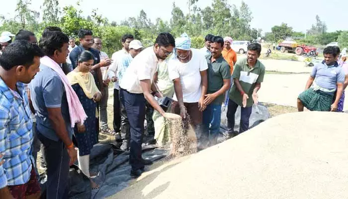 Wanaparthy Collector Adarsh Surabhi inspects paddy procurement centers, directs smooth operations and bonus credit to farmers.