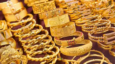 Gold prices hit record highs in Delhi and Hyderabad, with international factors and Fed rate expectations driving the surge.